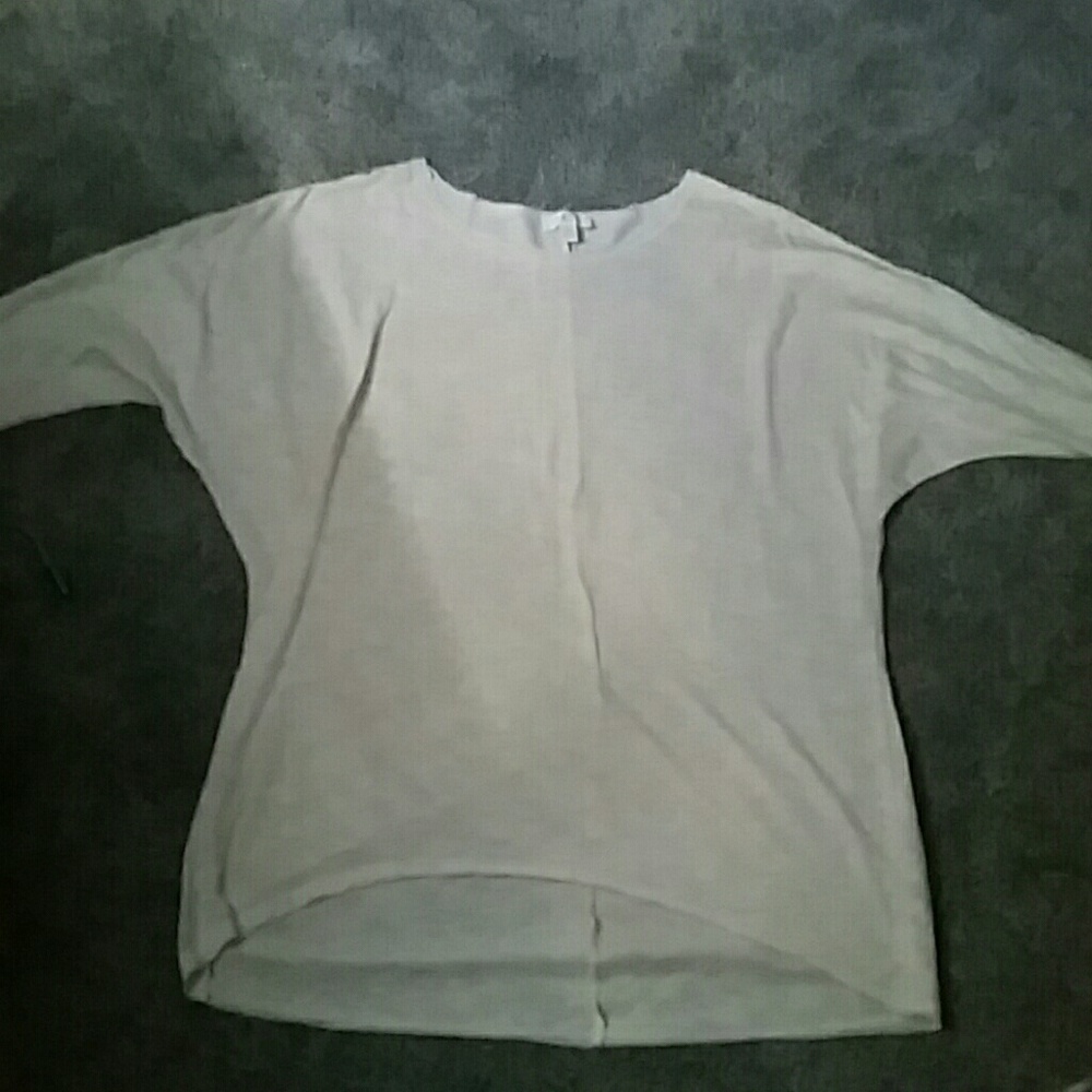 Cream colored half sleeve top